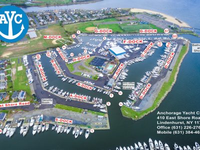Aerial view of a marina showing the layout of its docks and boat slips.